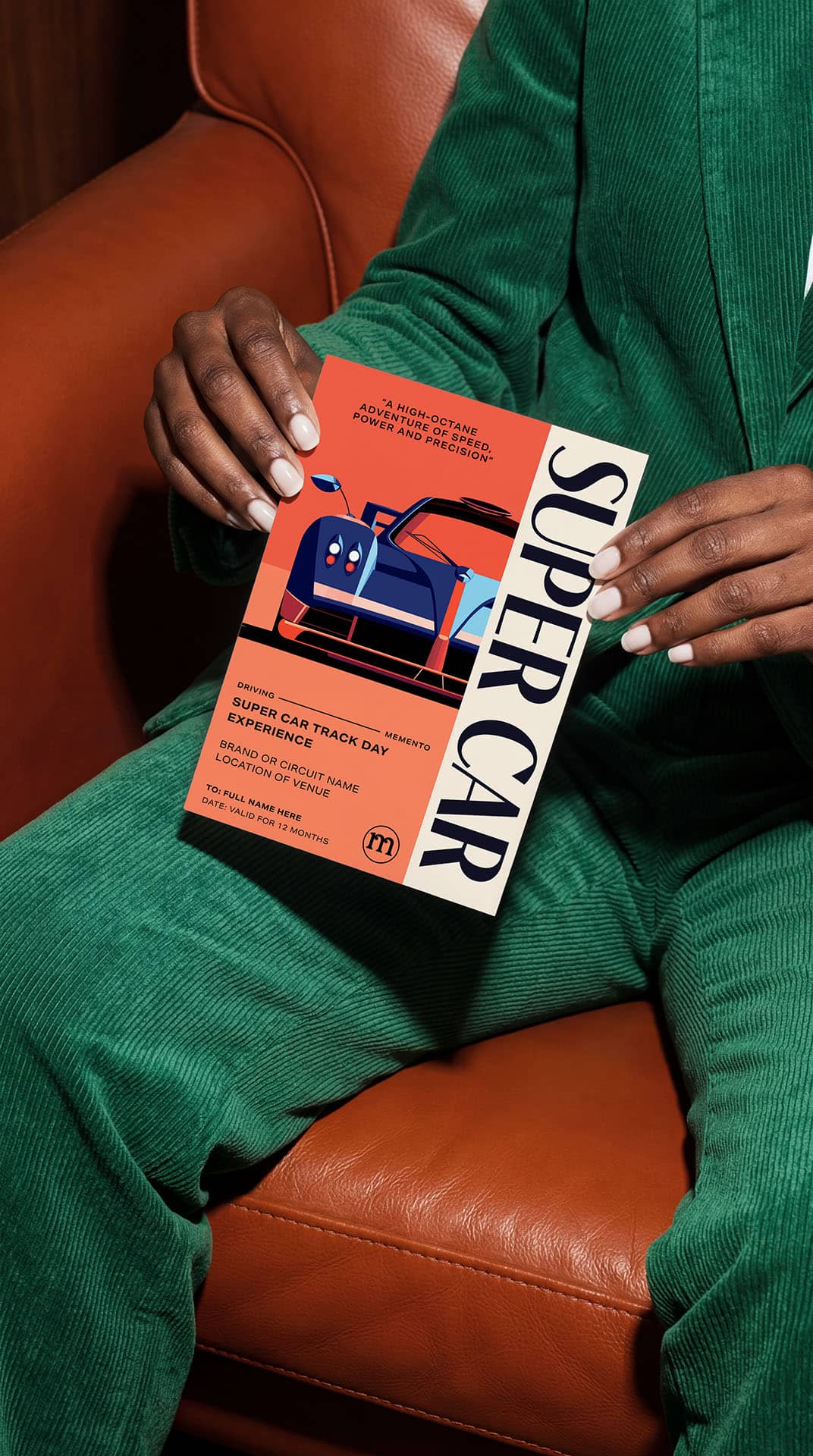 A personalised supercar experience gift voucher keepsake ticket by Momeo held in hand.